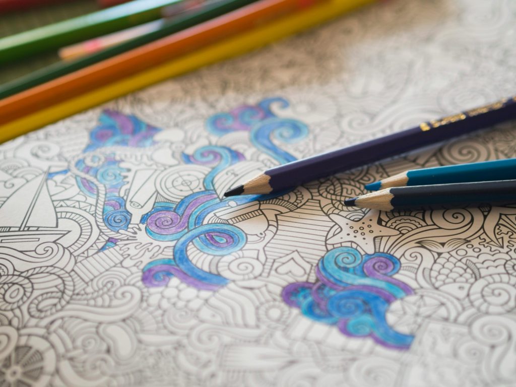 Coloring pencils on patterned paper
